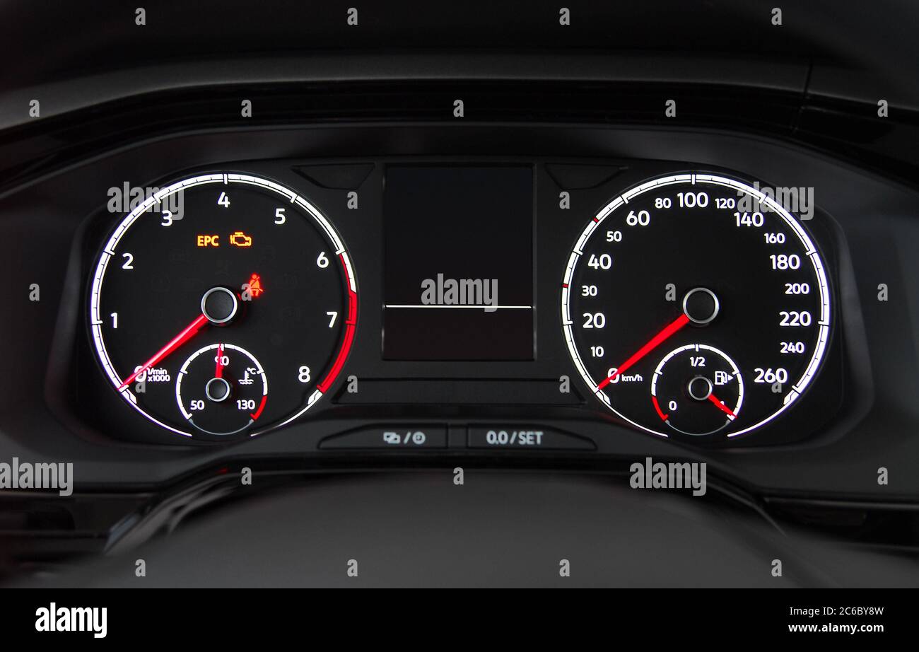Car illuminated dashboard. Modern car illuminated dashboard closeup