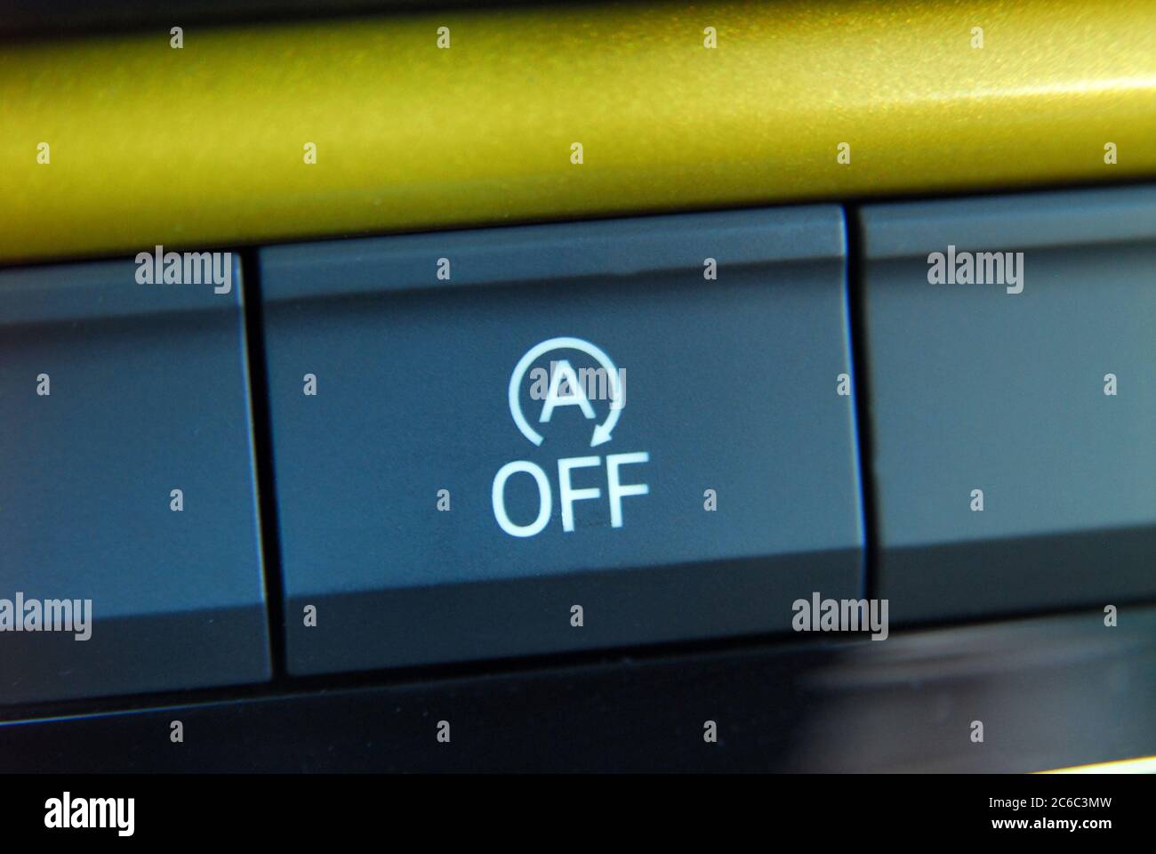 Stop-start system button. The stop-start system for more efficient fuel consumption. Stock Photo