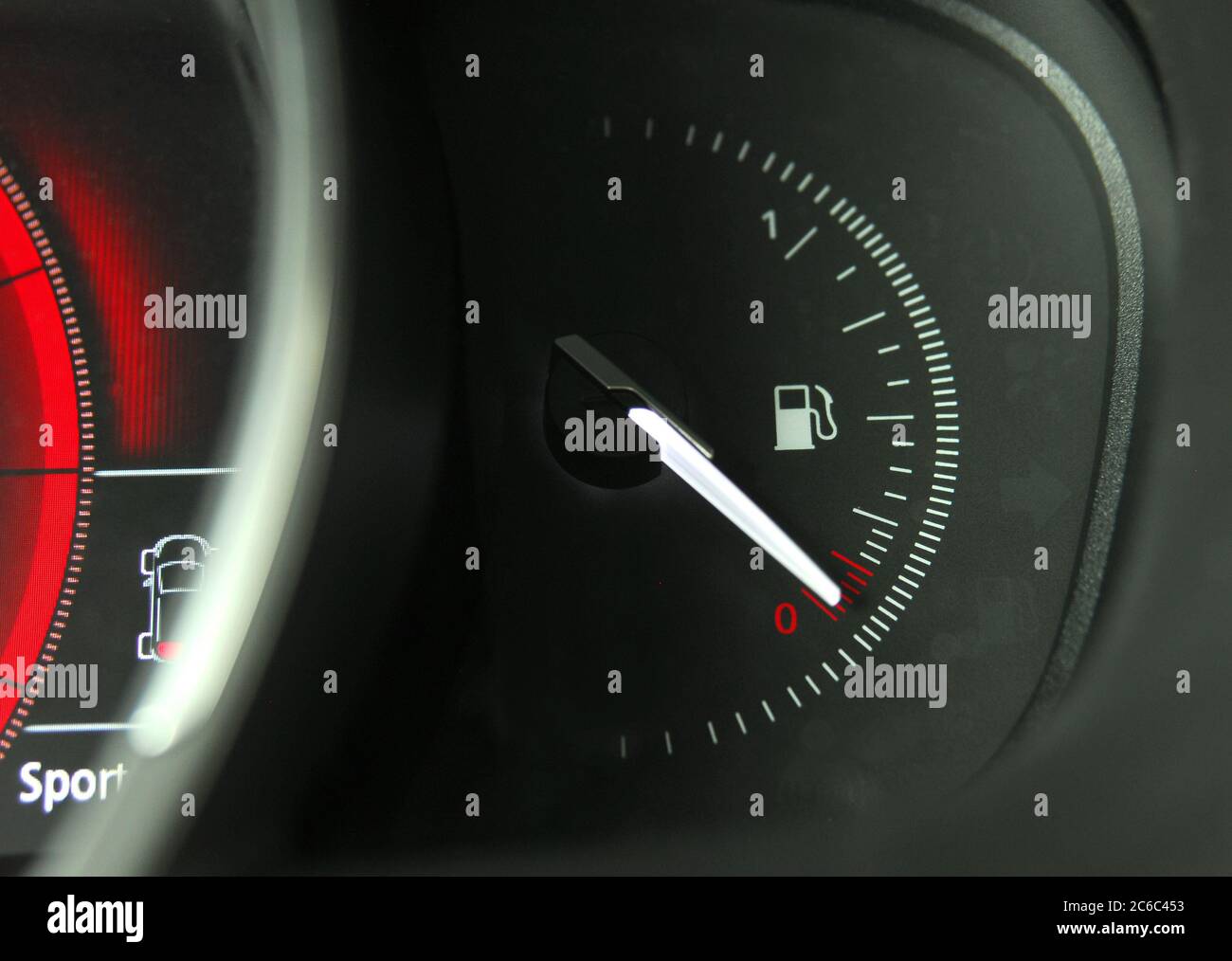 A fuel gauge in a car that shows a low level Stock Photo Alamy