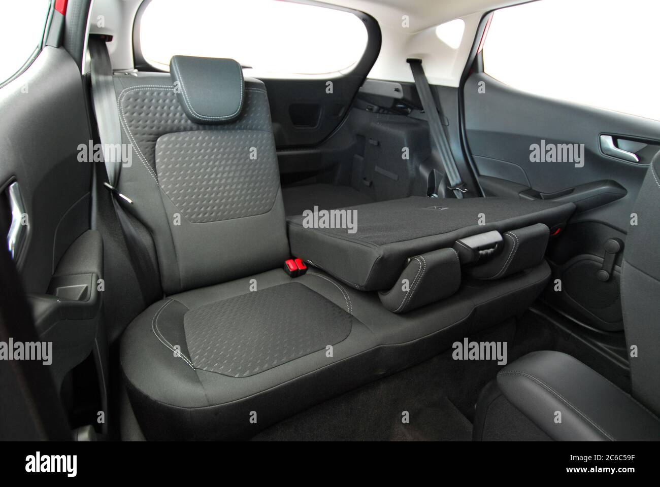 Folded rear seat of the car. Down rear seats of a modern passenger car