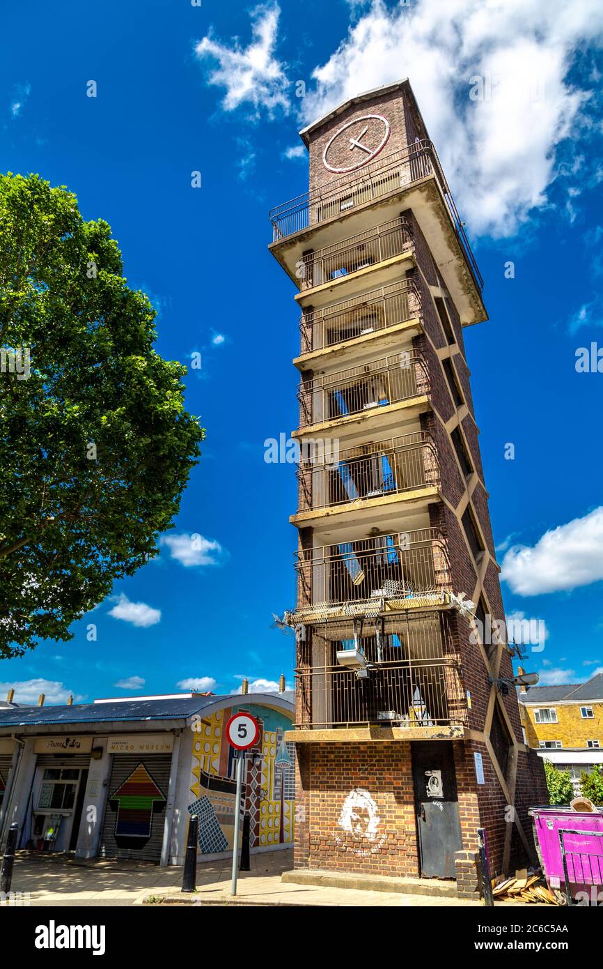 1950s clock tower at Chrisp Street Market in Poplar, London, UK Stock Photo