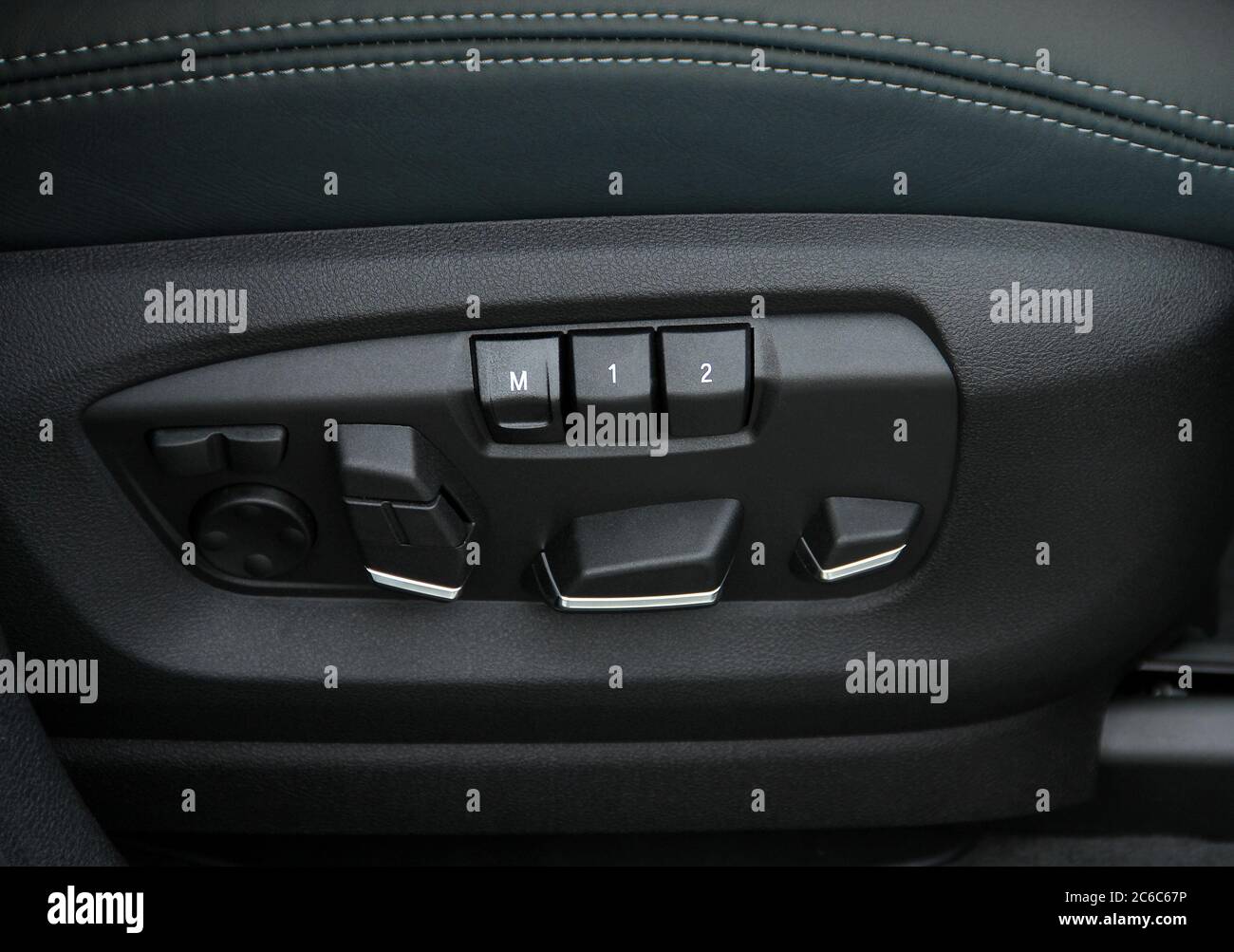 Buttons for adjusting seat position. Car interior detail Stock Photo