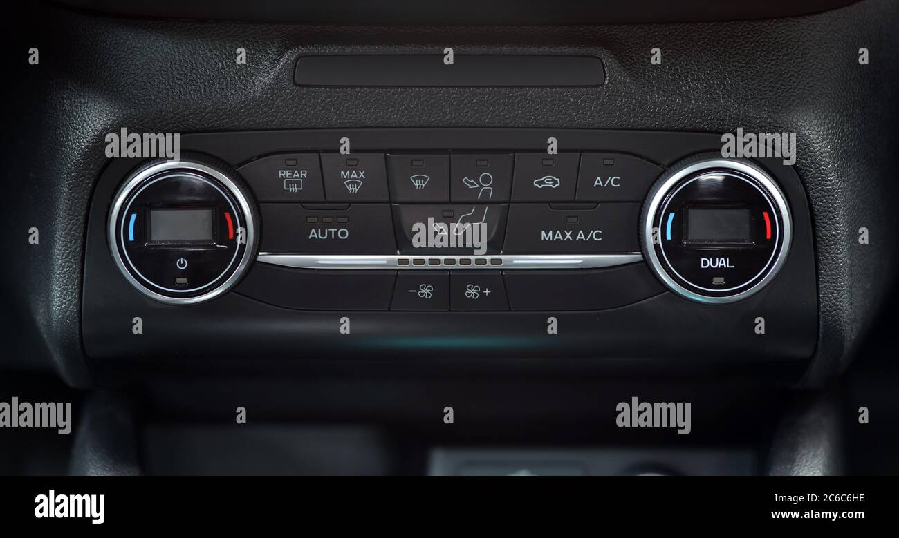Panel on car dashboard with controls for air conditioning Stock