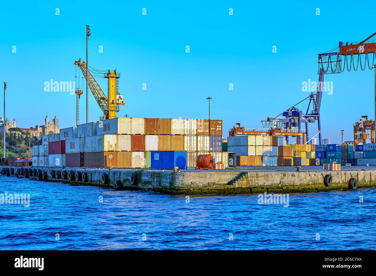 Istanbul, Turkey - February 13, 2020: Uncovered storage area or container terminal for  temporarily stored cargo in sea port. Freight shipping. Stock Photo