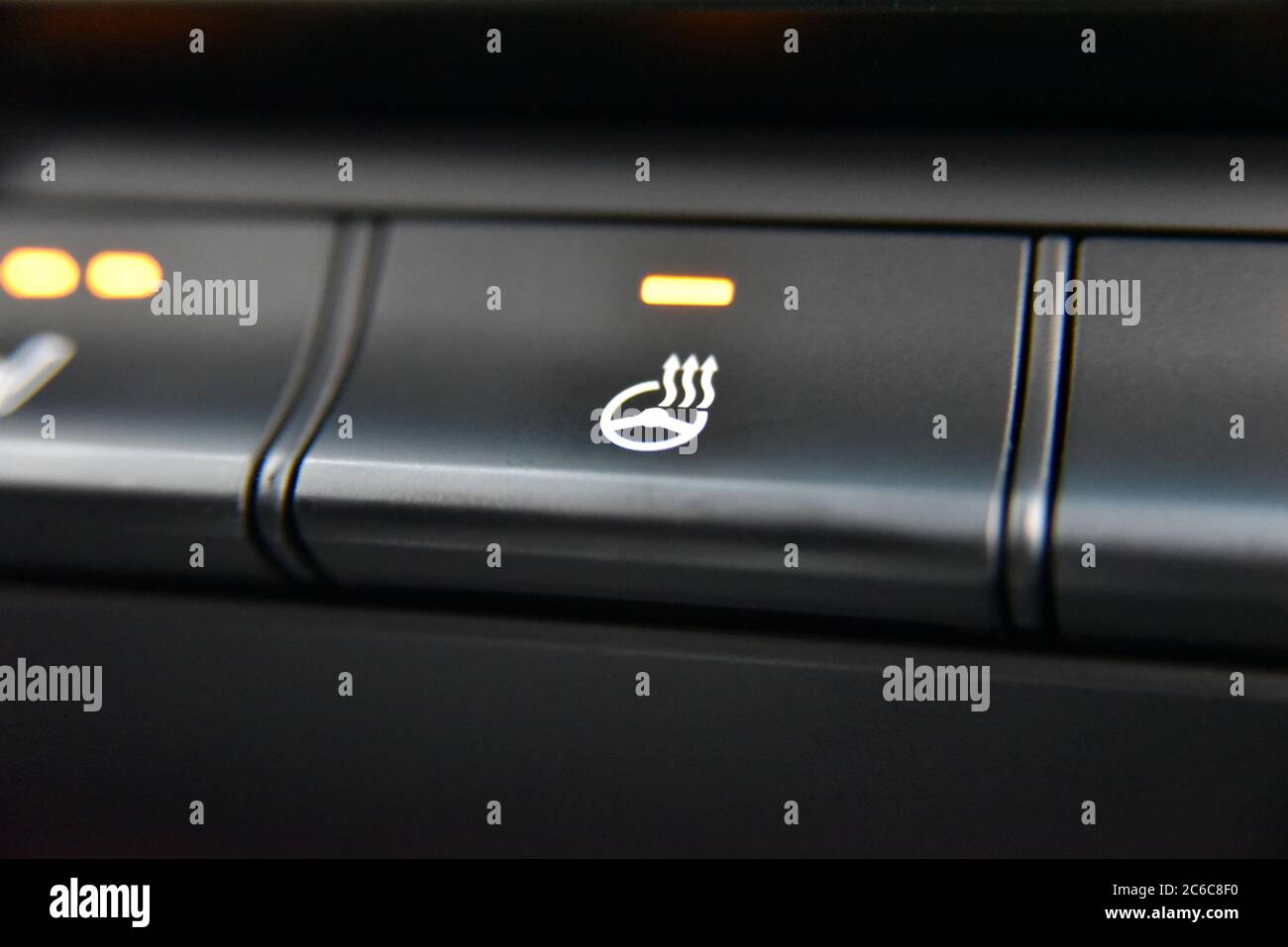 Steering wheel heating button in the car Stock Photo Alamy
