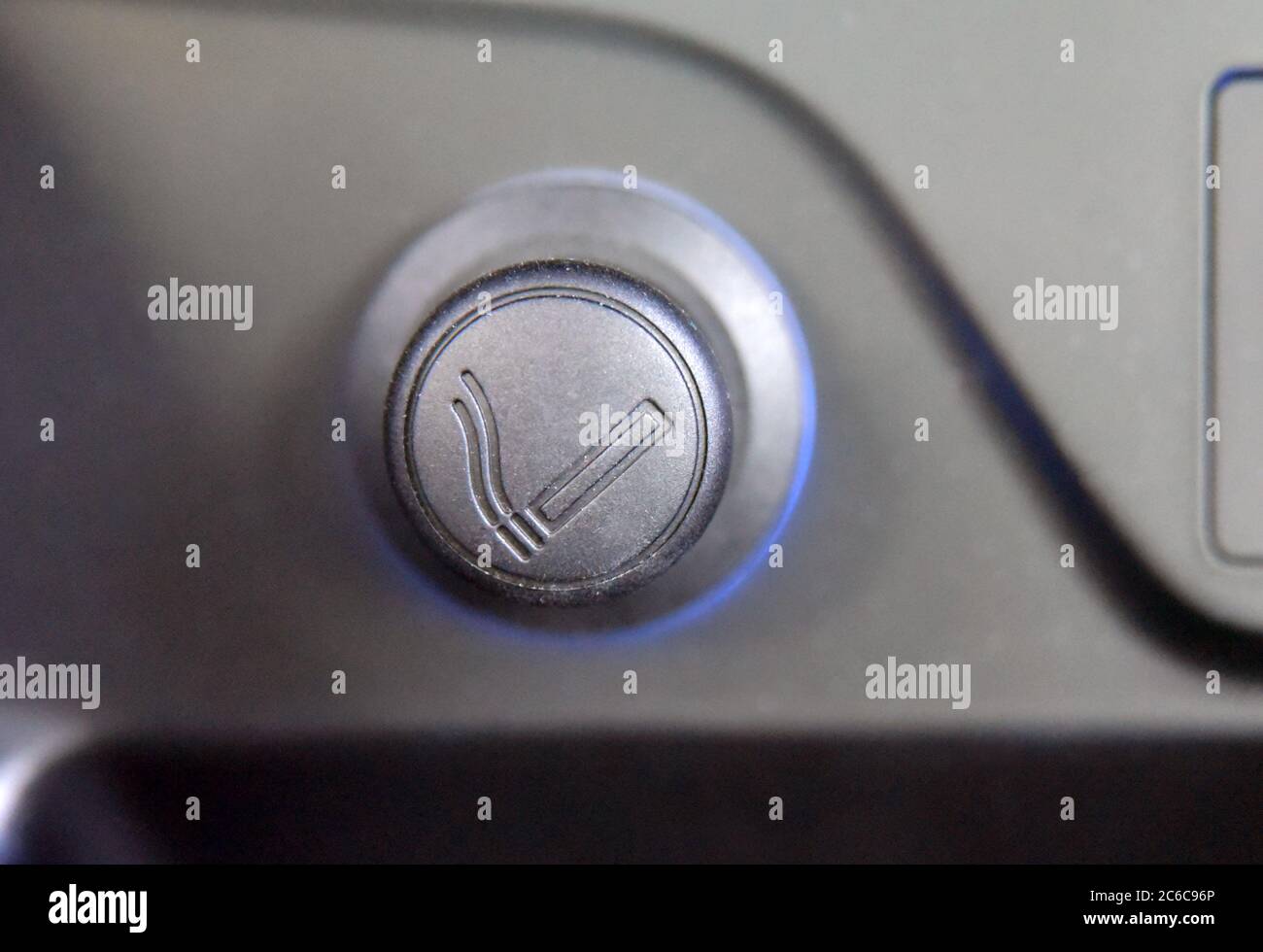 Cigarette lighter on the dashboard of a passenger car Stock Photo