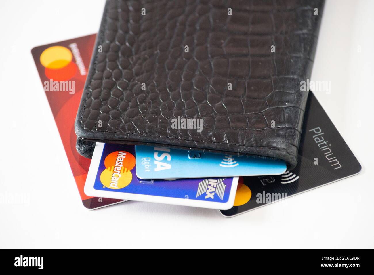 Closed wallet or purse with cards, debit, credit, bank - concept for cashless, no cash, no physical money, move towards cashless society, contactless Stock Photo