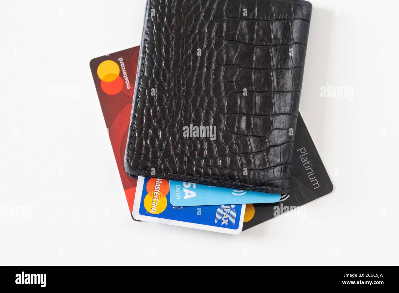 Closed wallet or purse with cards, debit, credit, bank - concept for cashless, no cash, no physical money, move towards cashless society, contactless, Stock Photo