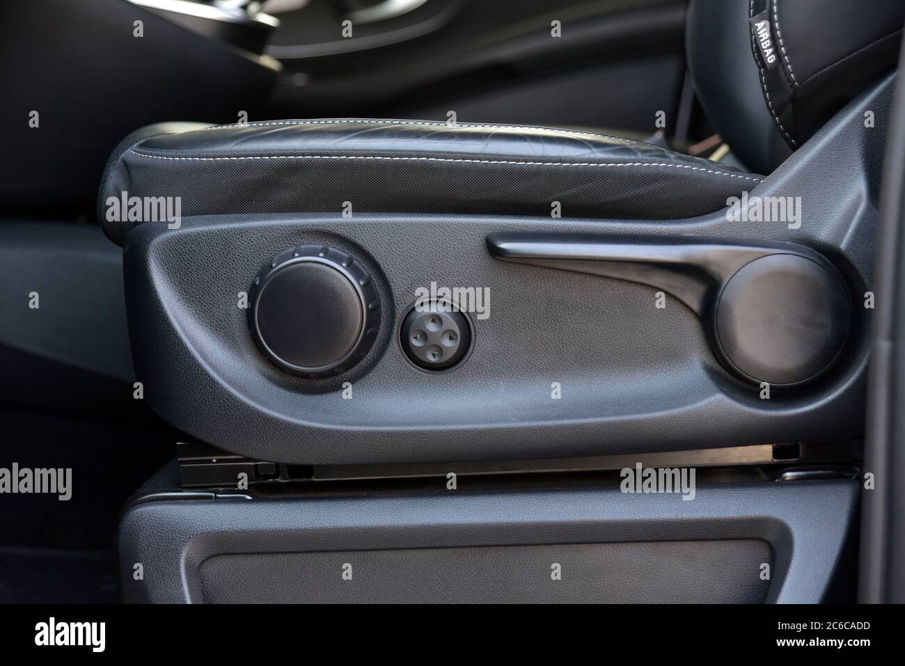 Buttons for adjusting seat position. Car interior detail Stock Photo