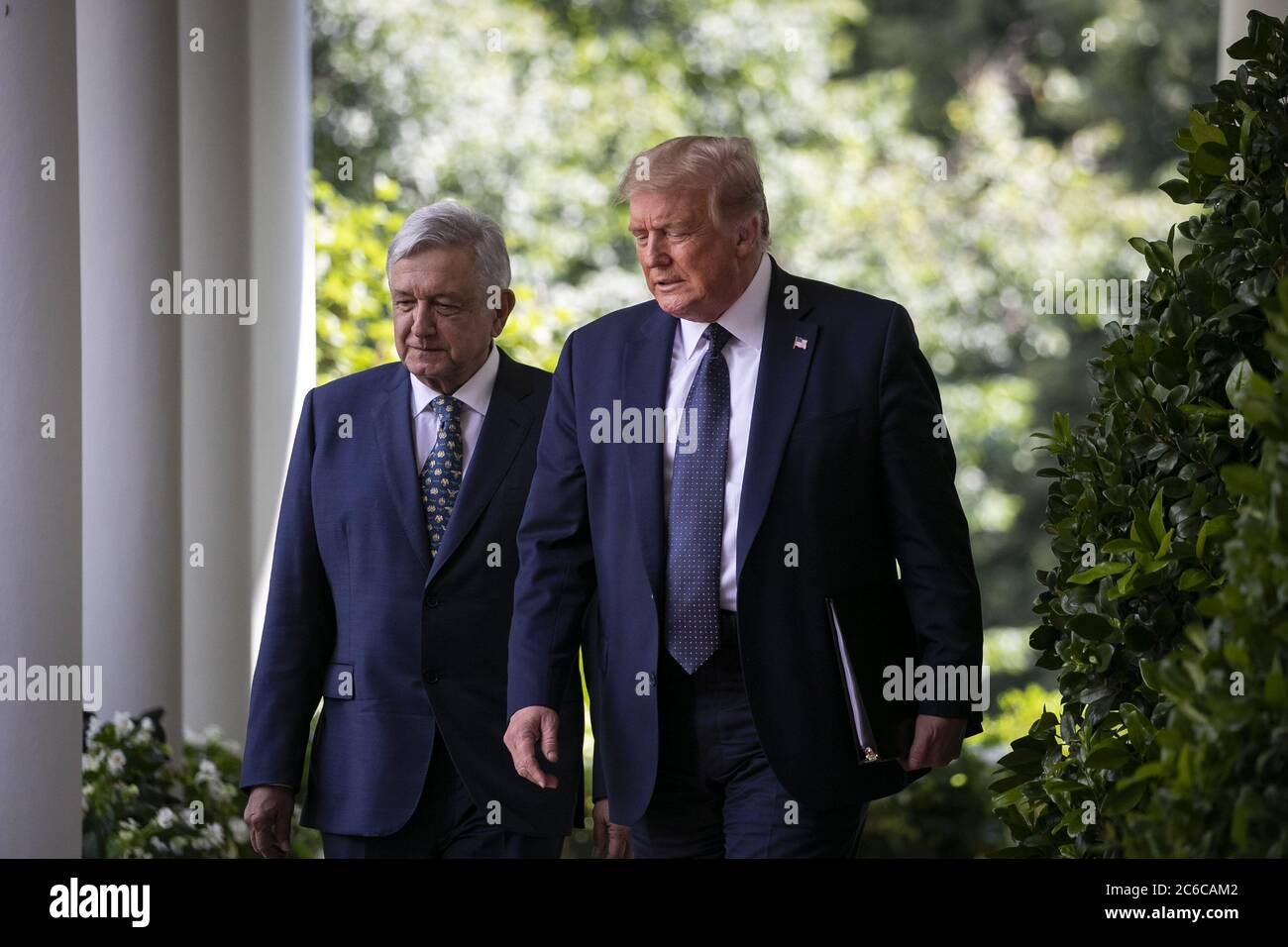Washington, United States. 08th July, 2020. President Donald Trump, right, and Andres Manuel Lopez Obrador, Mexico's president, arrive to a signing ceremony in the Rose Garden of the White House in Washington, DC, on Wednesday, July 8, 2020. Photo by Al Drago/UPI Credit: UPI/Alamy Live News Stock Photo