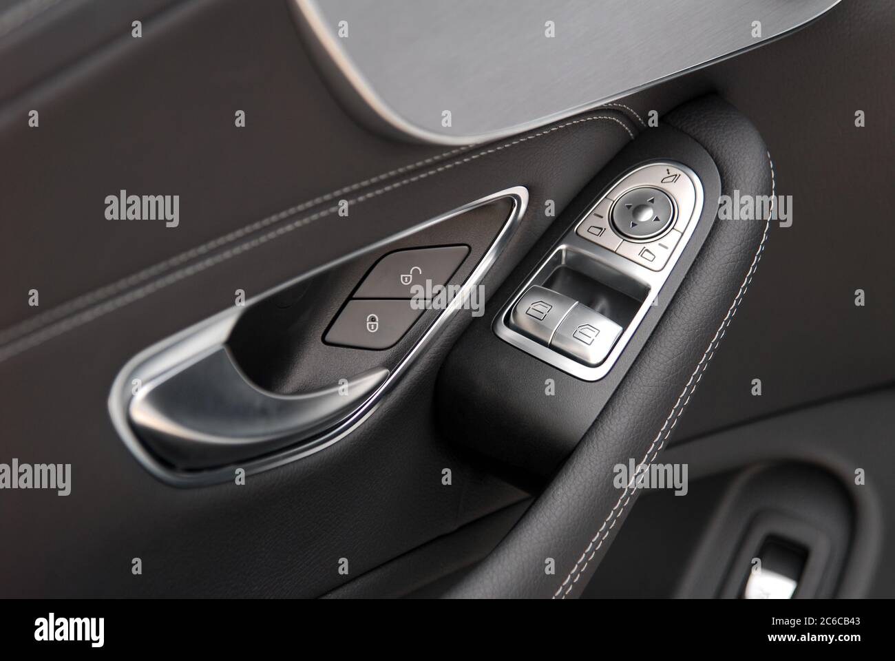 side mirror switch control, window control, central locking and car door handles Stock Photo Alamy