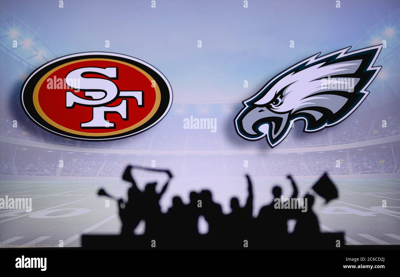 San Francisco 49ers vs. Philadelphia Eagles. Fans support on NFL Game.  Silhouette of supporters, big screen with two rivals in background Stock  Photo - Alamy