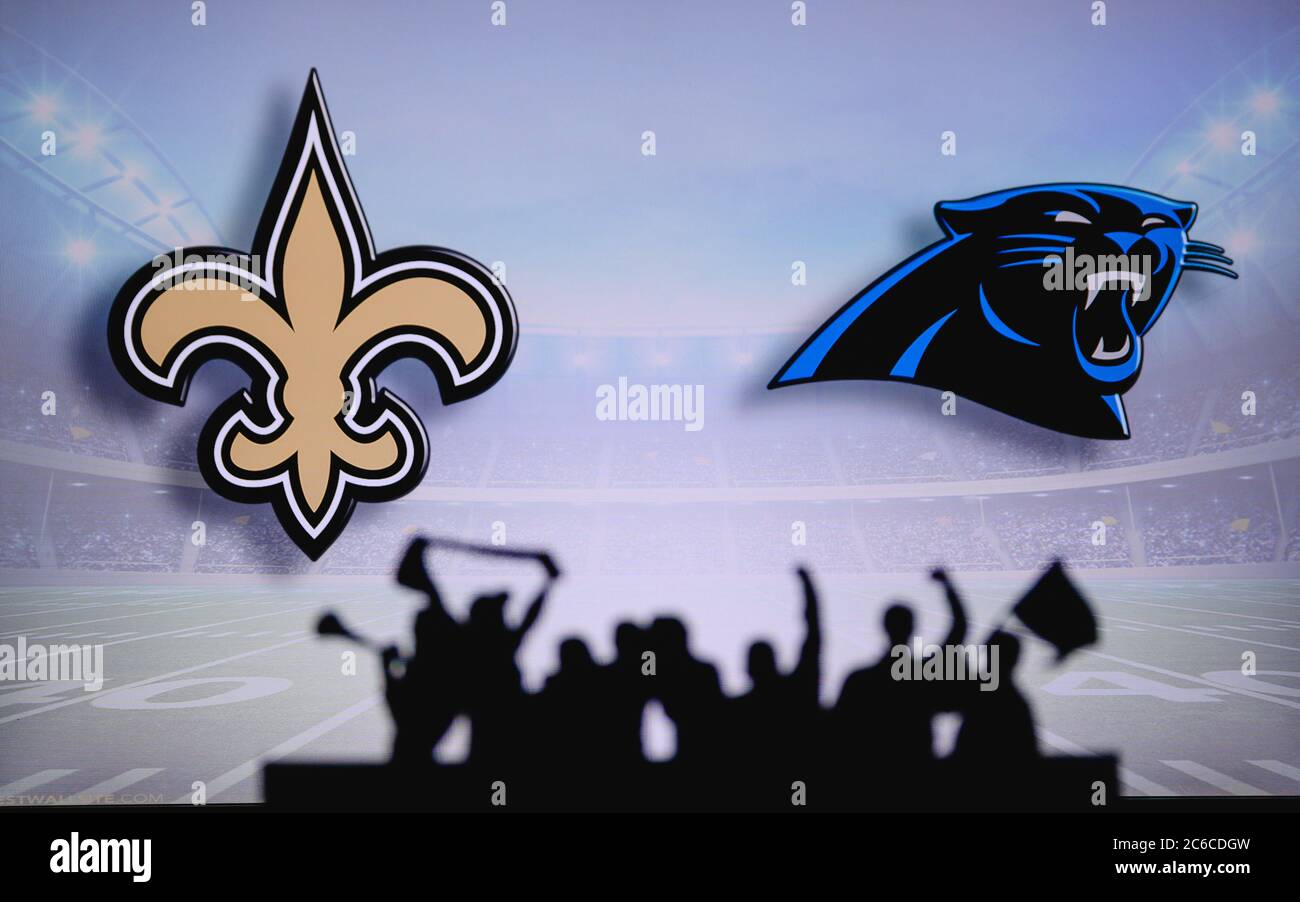 New Orleans Saints vs. Atlanta Falcons. Fans support on NFL Game.  Silhouette of supporters, big screen with two rivals in background Stock  Photo - Alamy