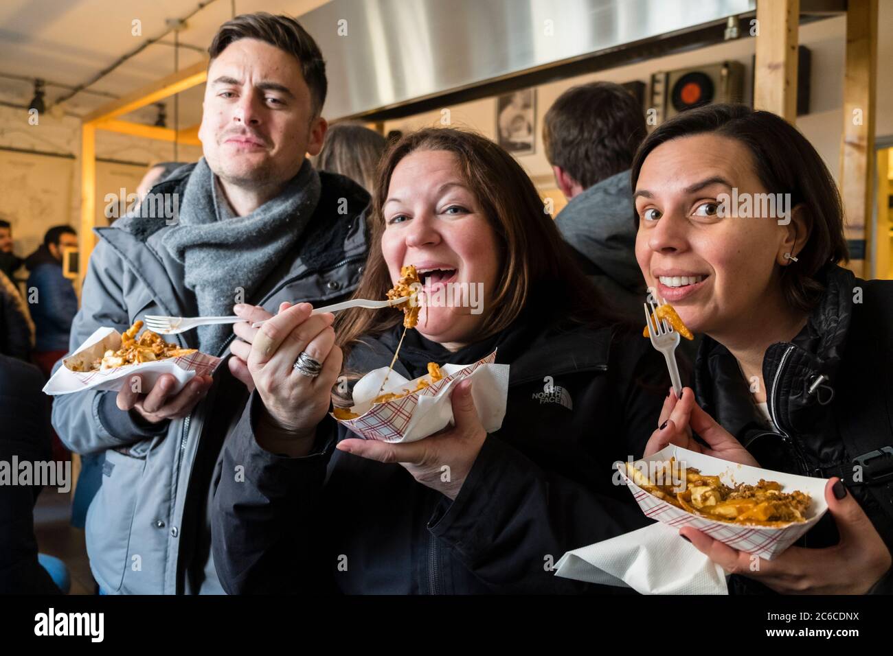 Patrons of Prague's only poutine restaurant enjoy their lunch Stock Photo