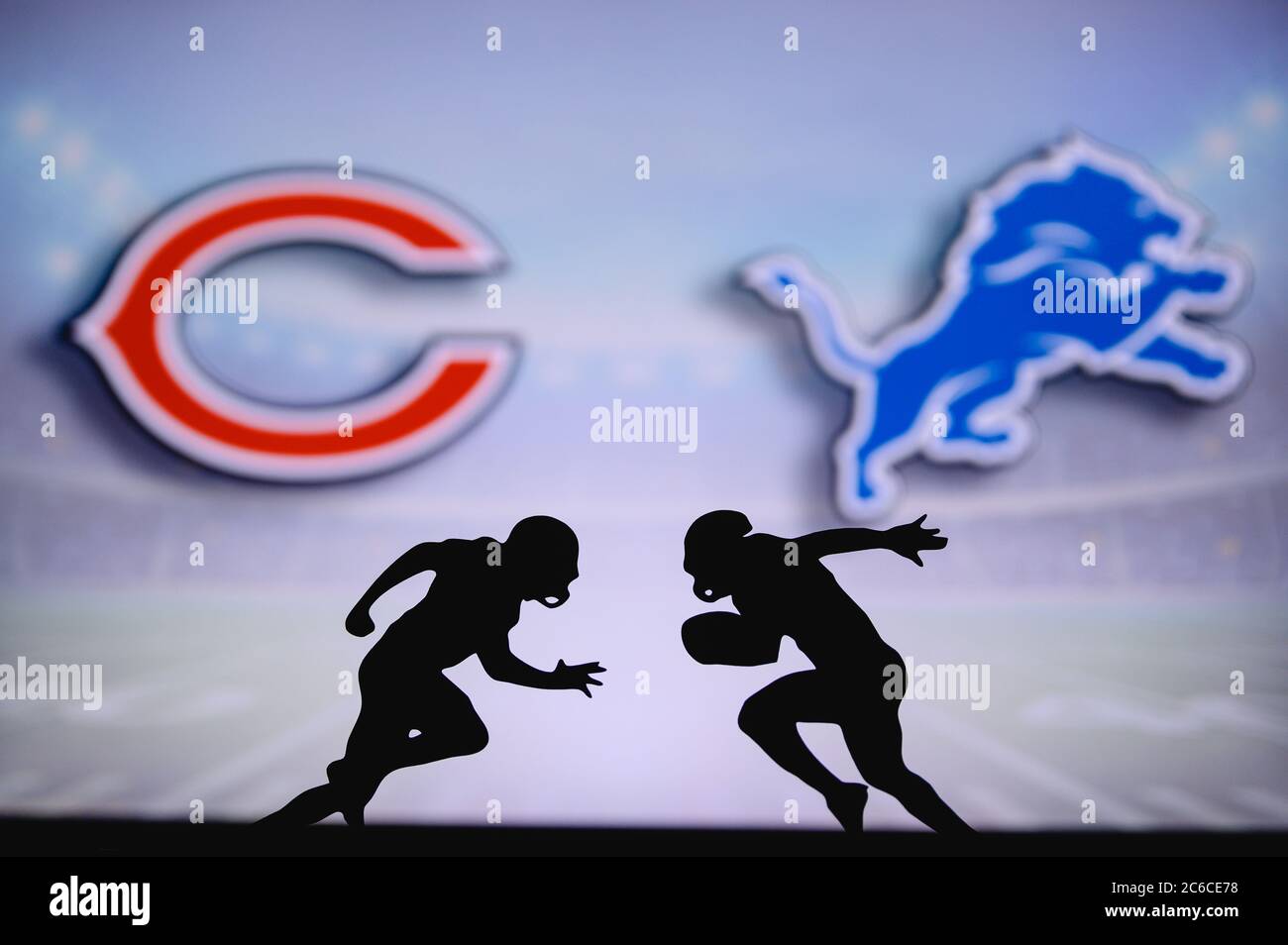 Chicago Bears vs. Detroit Lions. NFL match poster. Two american football players silhouette facing each other on the field. Clubs logo in background. Stock Photo