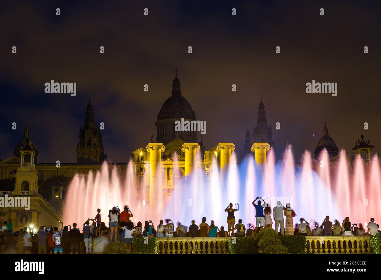 Magic Fountain light show at night next to National museum in Barcelona