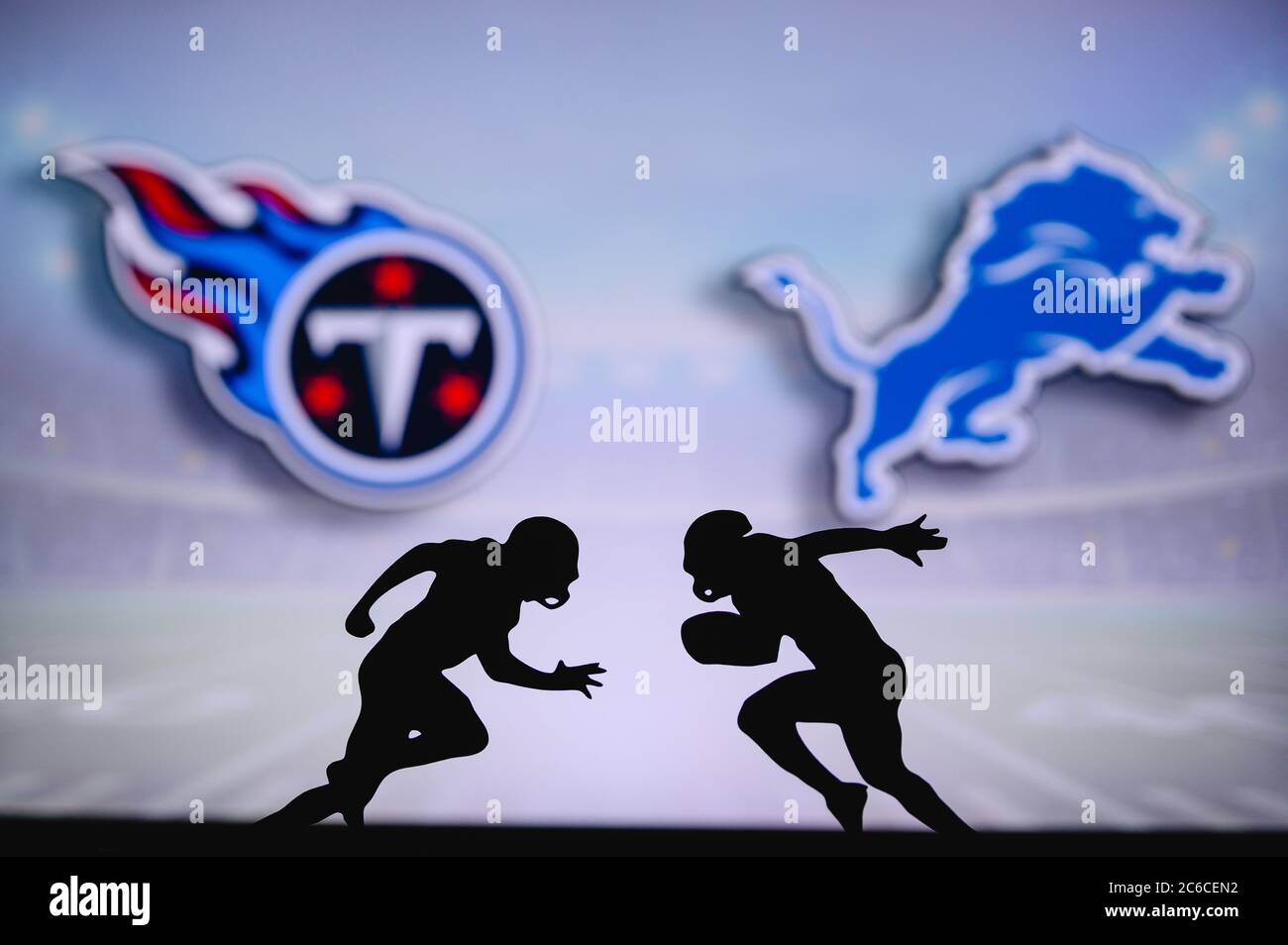 Tennessee Titans vs. Detroit Lions. NFL match poster. Two american football players silhouette facing each other on the field. Clubs logo in backgroun Stock Photo