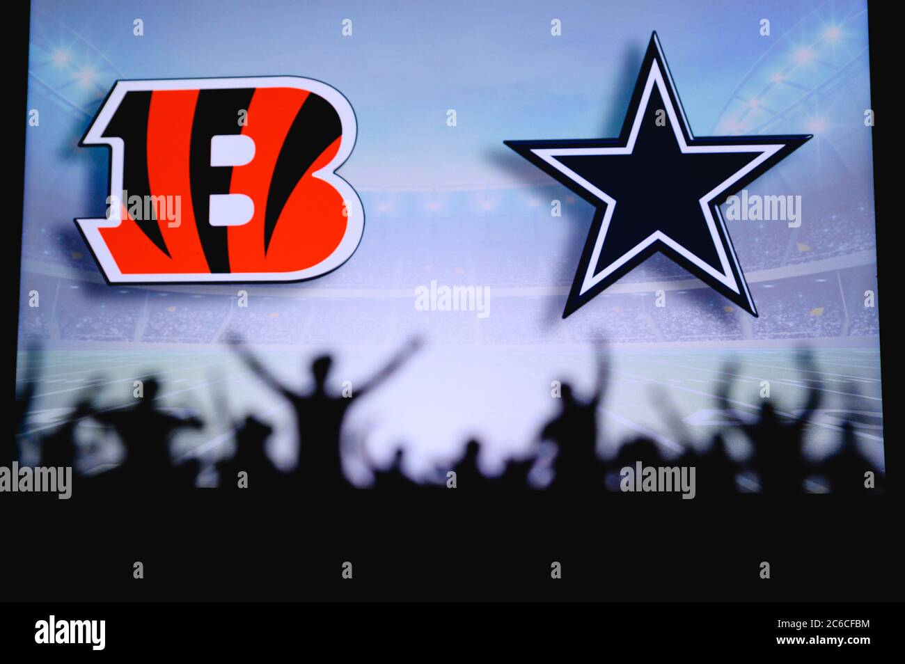 Cincinnati Bengals vs. Dallas Cowboys. Fans support on NFL Game. Silhouette  of supporters, big screen with two rivals in background Stock Photo - Alamy