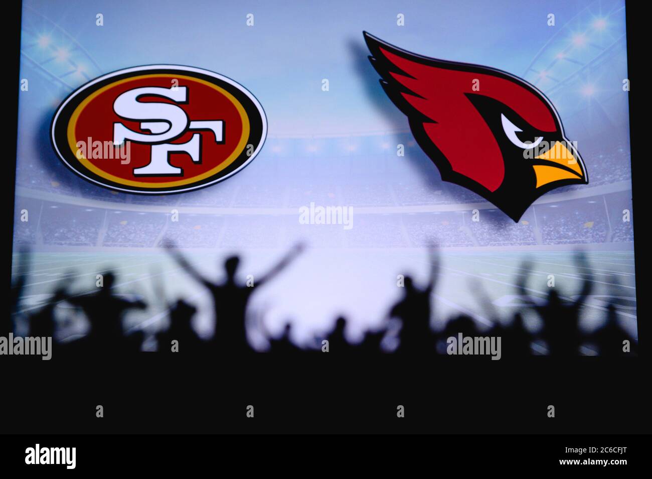 San Francisco 49ers vs. Arizona Cardinals . Fans support on NFL Game.  Silhouette of supporters, big screen with two rivals in background Stock  Photo - Alamy