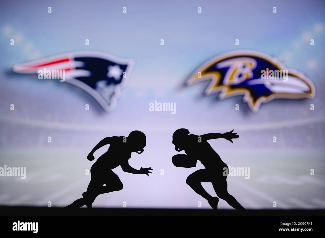 New England Patriots vs. Baltimore Ravens. NFL match poster. Two american football players silhouette facing each other on the field. Clubs logo in ba Stock Photo