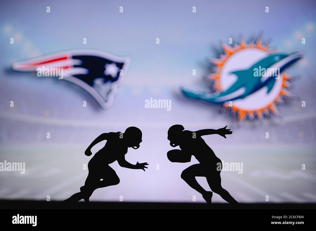 New England Patriots vs. Miami Dolphins. NFL match poster. Two american  football players silhouette facing each other on the field. Clubs logo in  back Stock Photo - Alamy
