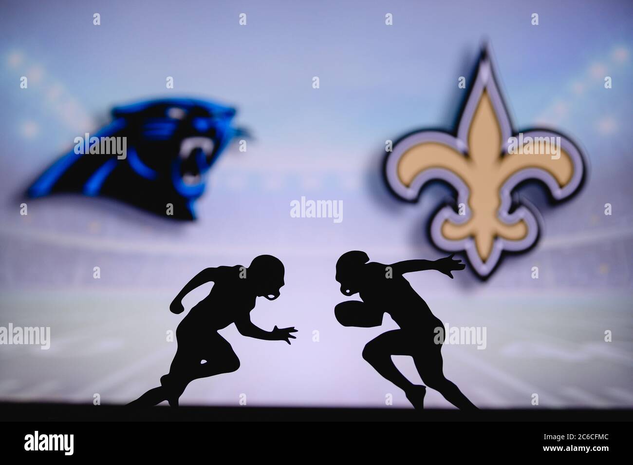Carolina Panthers vs. New Orleans Saints. NFL match poster. Two american  football players silhouette facing each other on the field. Clubs logo in  bac Stock Photo - Alamy