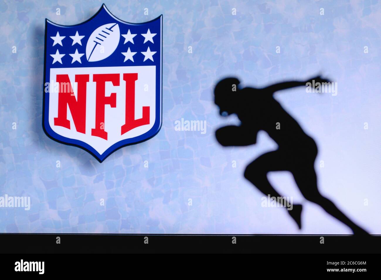 The National Football League – NFL. Silhouette of professional american  football player. Logo of NFL club in background, edit space Stock Photo -  Alamy
