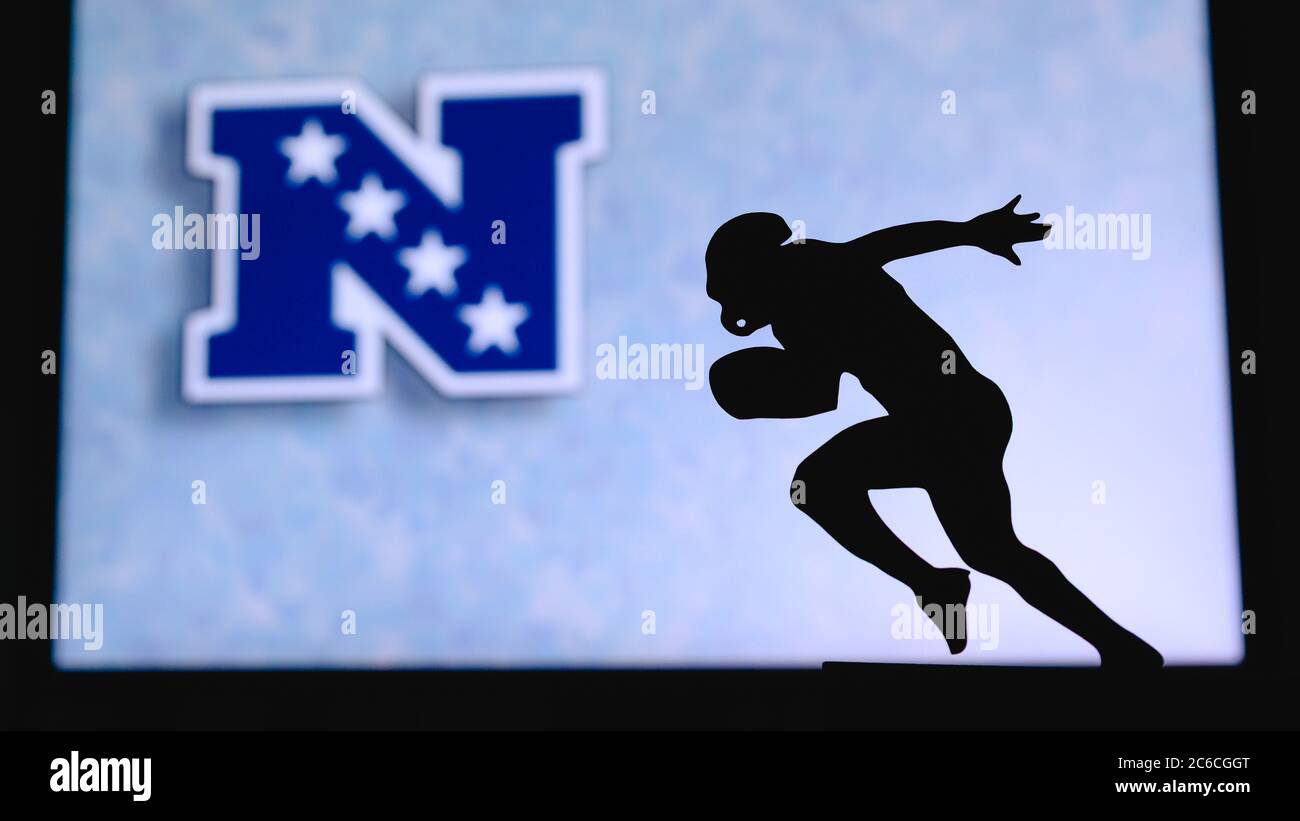 National Football Conference – NFC, . Silhouette of professional american  football player. Logo of NFL club in background, edit space Stock Photo -  Alamy
