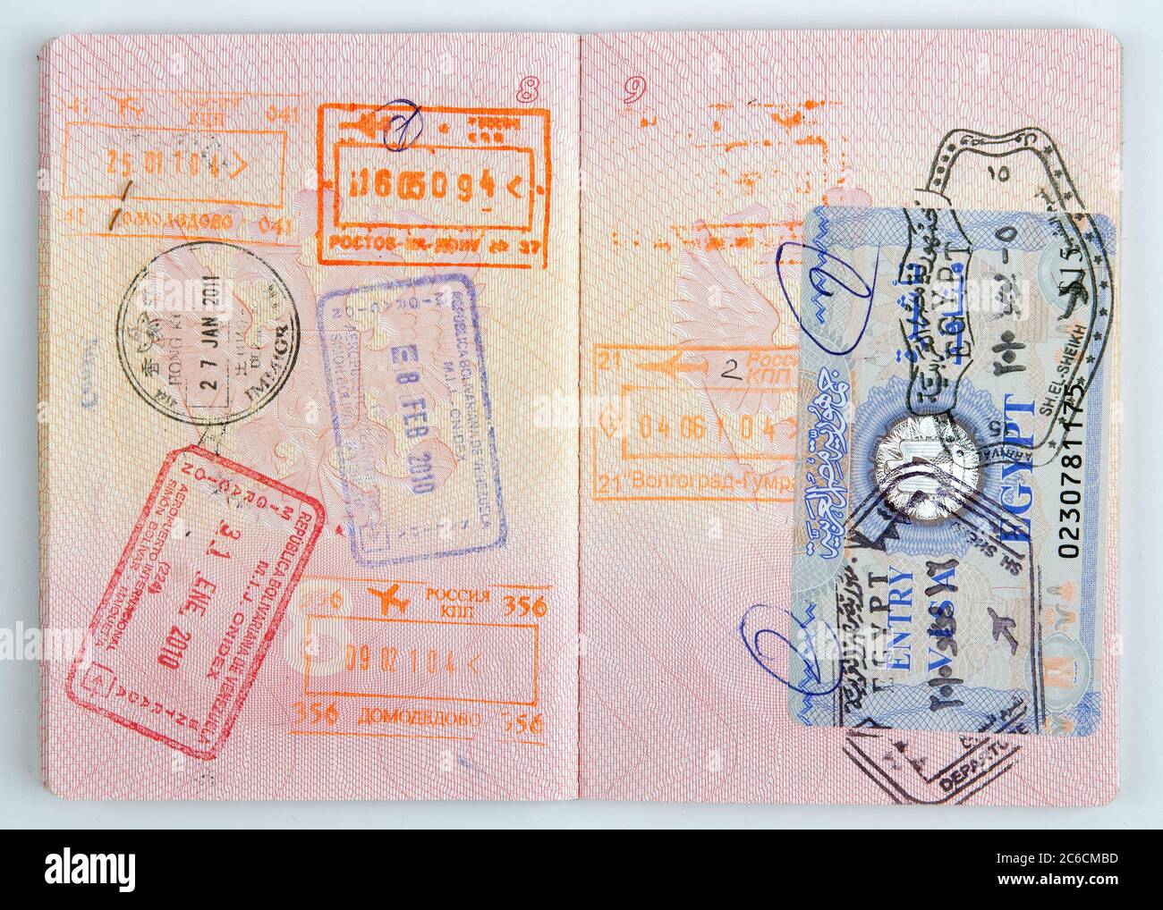 Russian passport with egyptian visa and stamps on the border of different countries Stock Photo