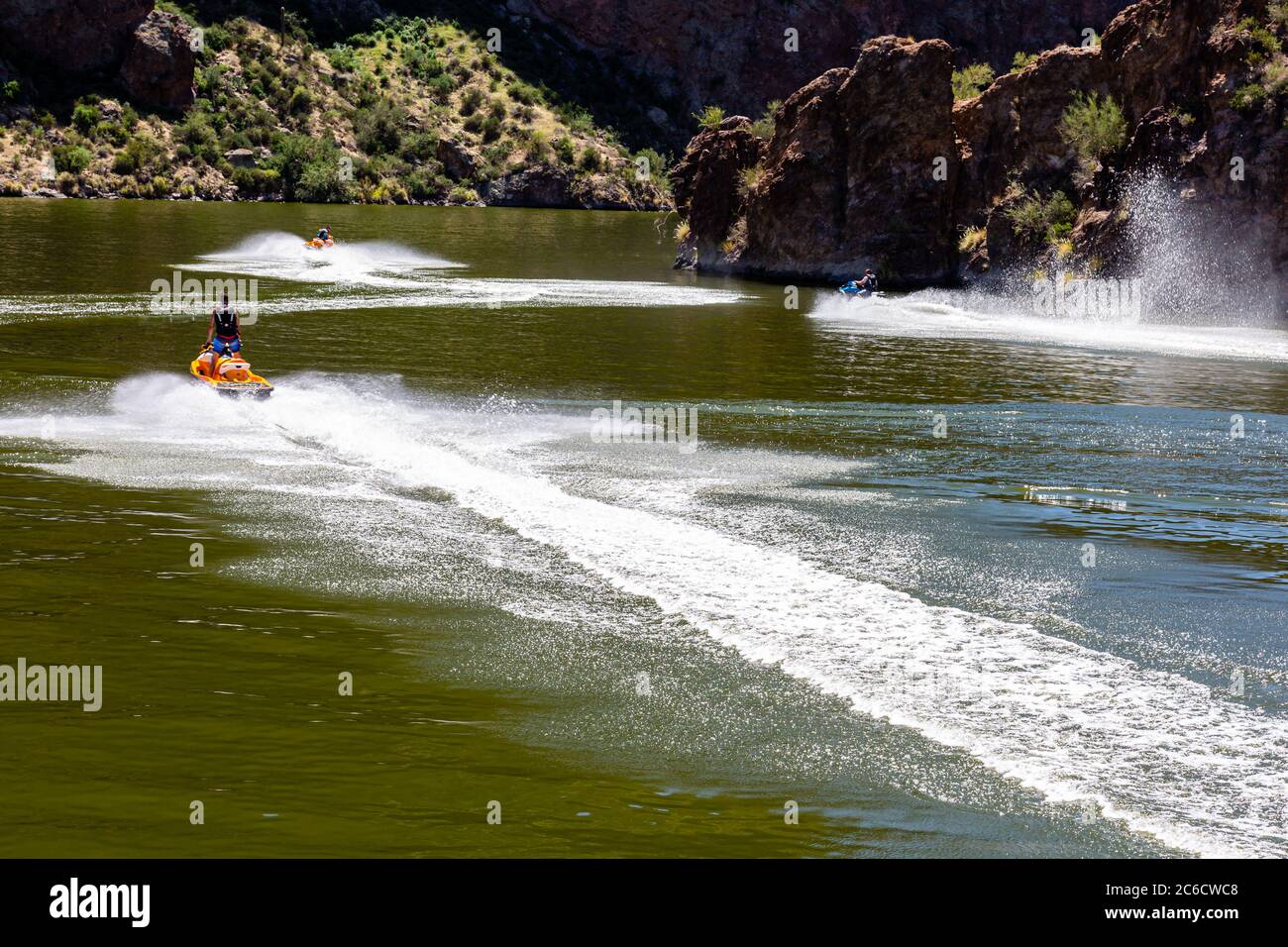 Jet ski enthusiasts enjoy a Summer day on Canyon Lake along the Salt