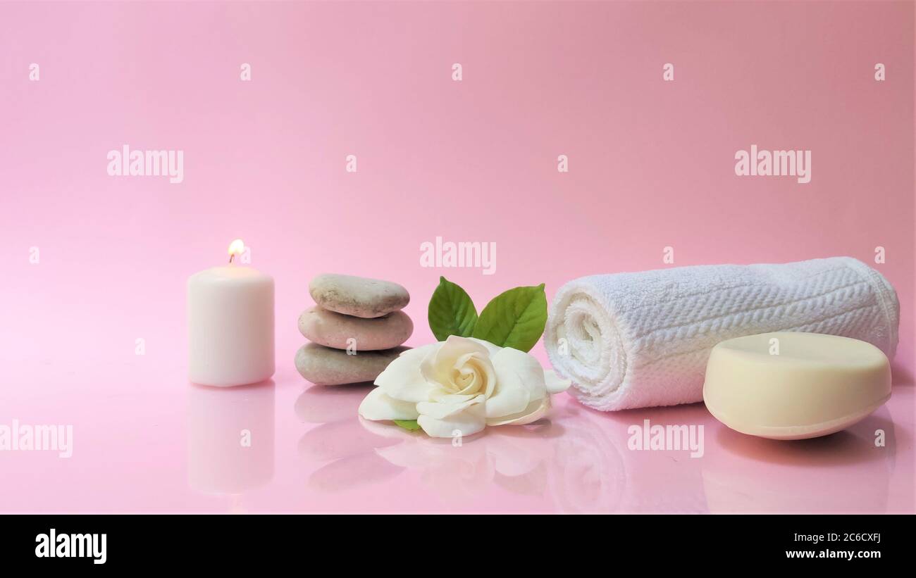 Spa Setting And Spa Background Composition With White Gardenia Flower On Pink Background Banner Towel Candles Flowers Stones Massage Oriental T Stock Photo Alamy