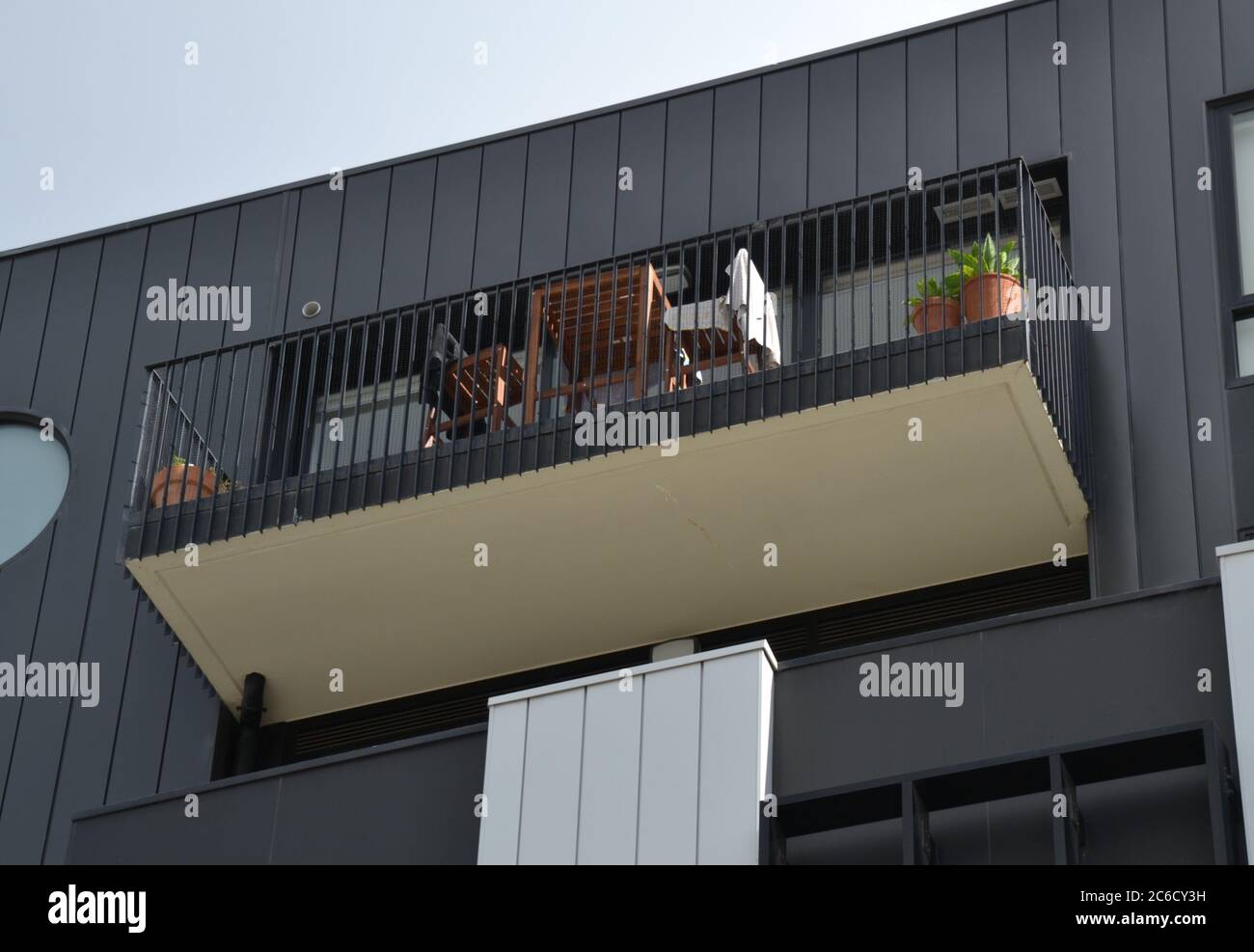 Outside balcony or deck from underside on a modern steel cladding apartment building in inner city Melbourne, Victoria Stock Photo