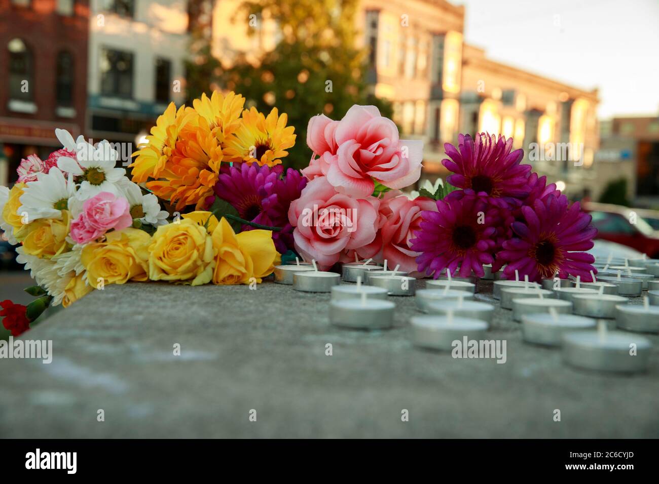 Bloomington, Indiana, USA. 7th June, 2020. Flowers and candles are placed on the steps of the