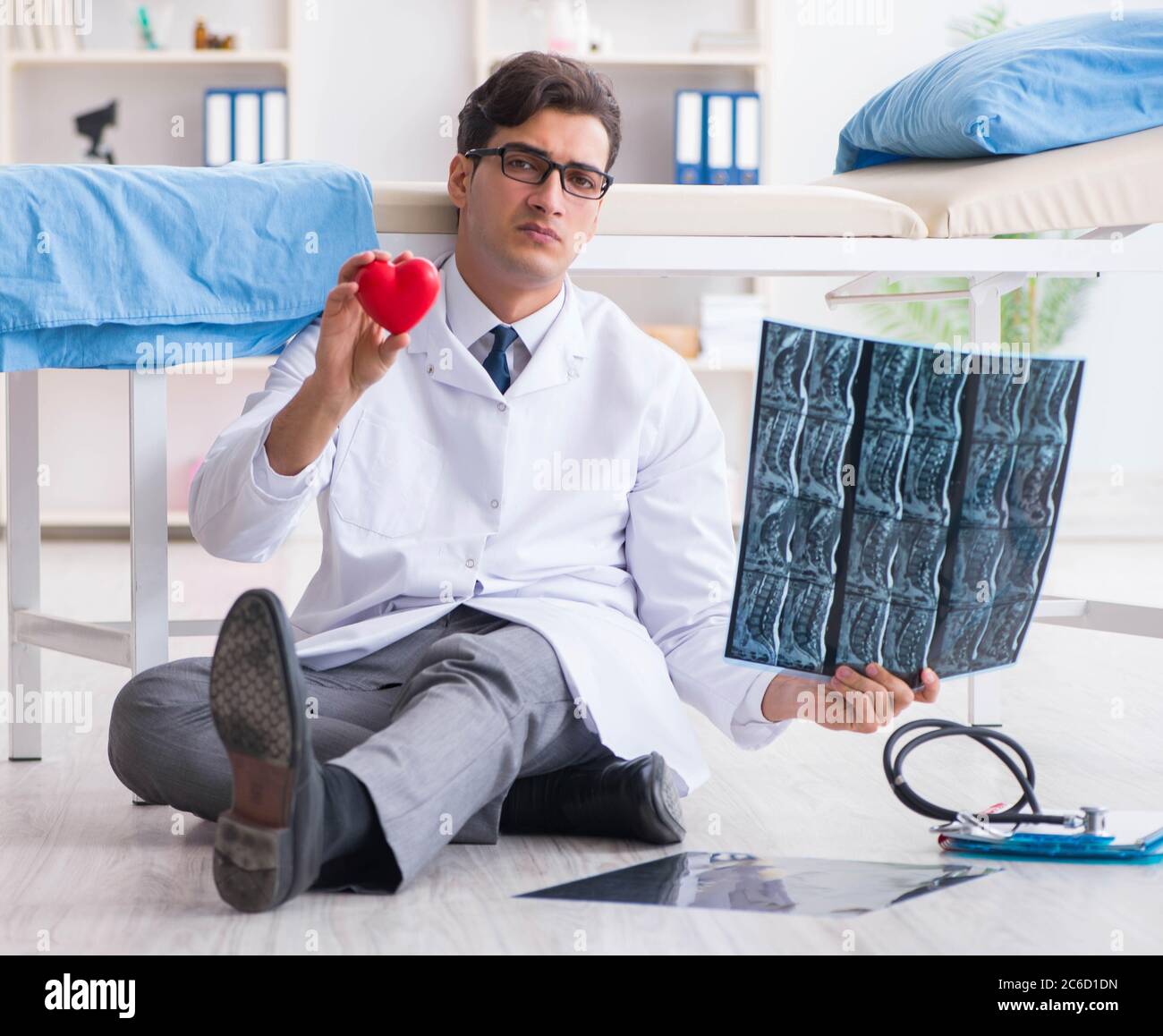 The cardiologist frustrated after unsuccessful surgery Stock Photo - Alamy
