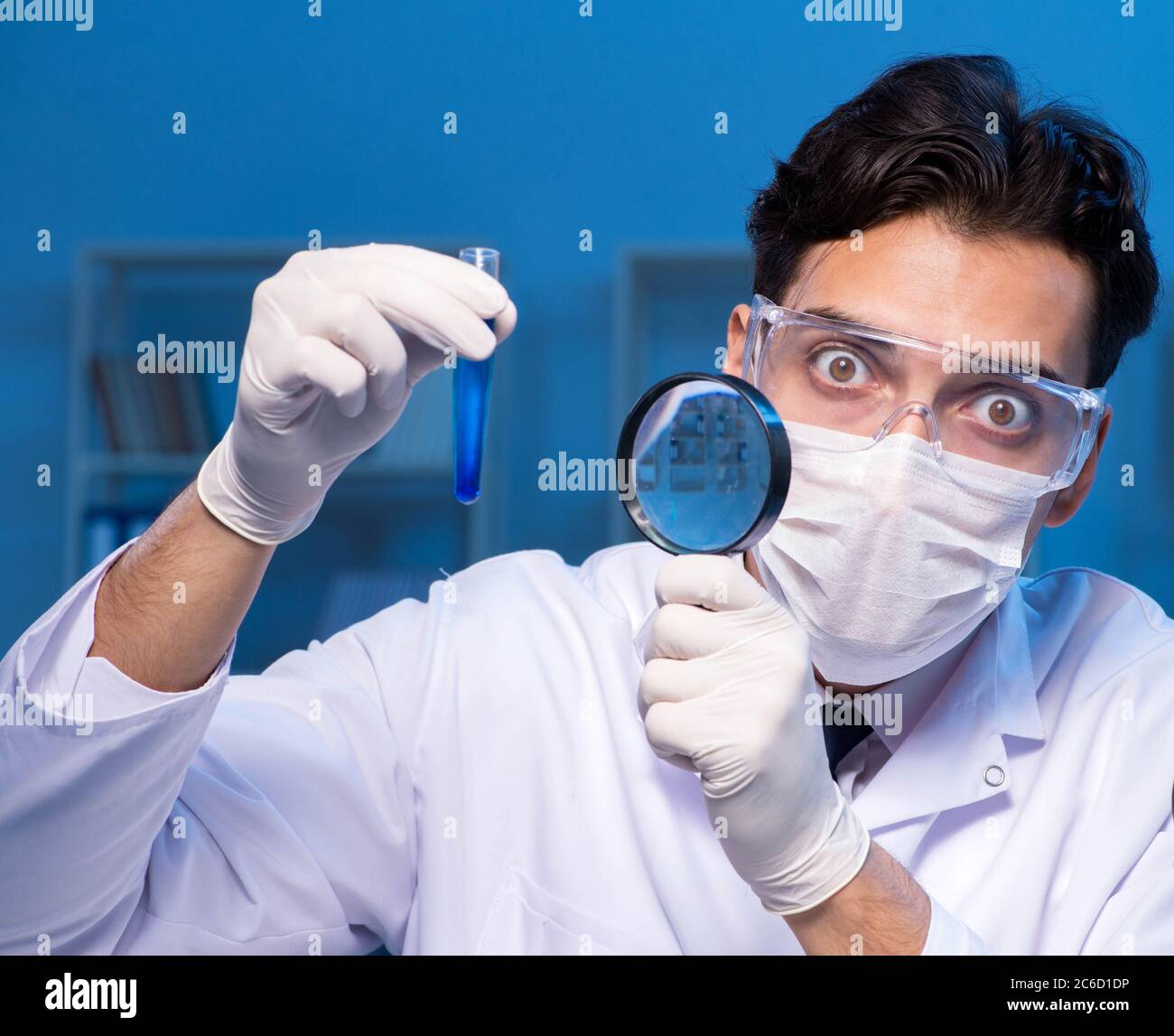 The chemistry assistant working in the chemical lab Stock Photo - Alamy