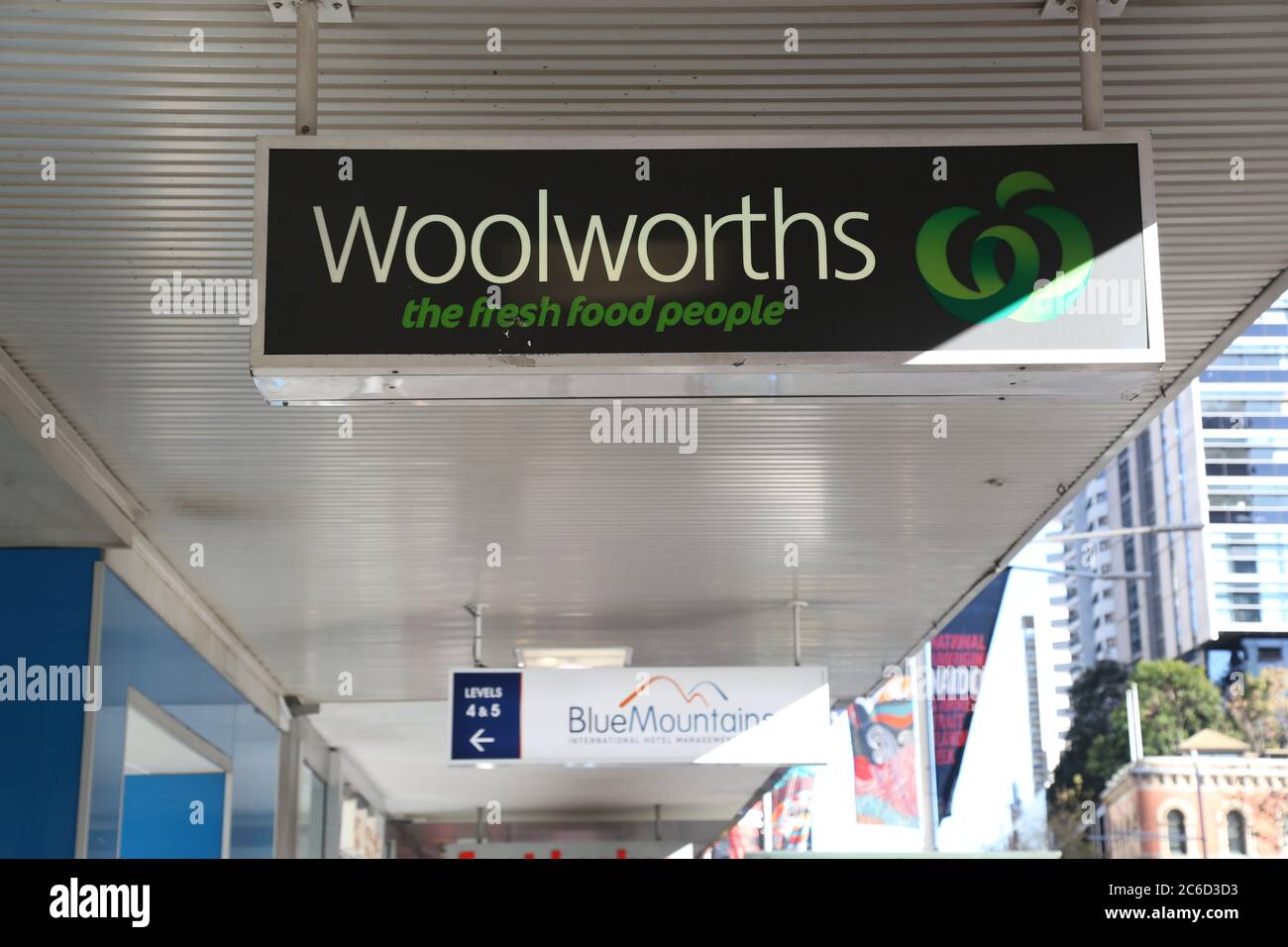 The Woolworths supermarket store opposite Sydney Town Hall at the corner of George Street and Park Street. Stock Photo