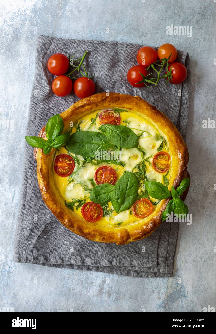 French vegetarian open pie or quiche with spinach, feta and mozzarella