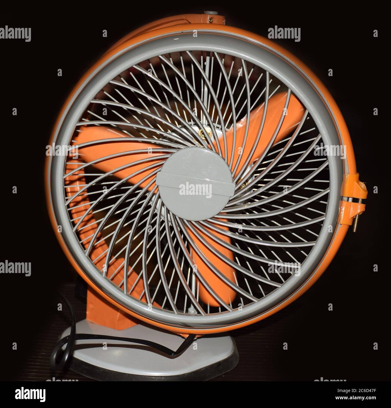 Portable mini table fan on black background Stock Photo