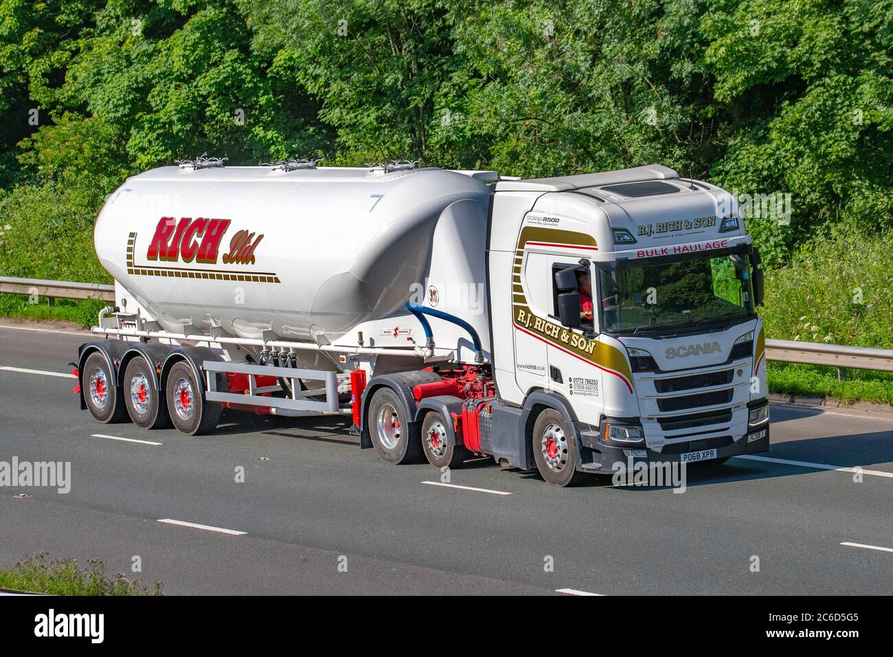 R J Rich  & SON; Bulk Powder Haulage delivery trucks, lorry, transportation, Spitzer Eurovrac commercial vehicles, truck, cargo carrier, Scania R500 vehicle, European commercial transport industry HGV, M6 at Manchester, UK Stock Photo