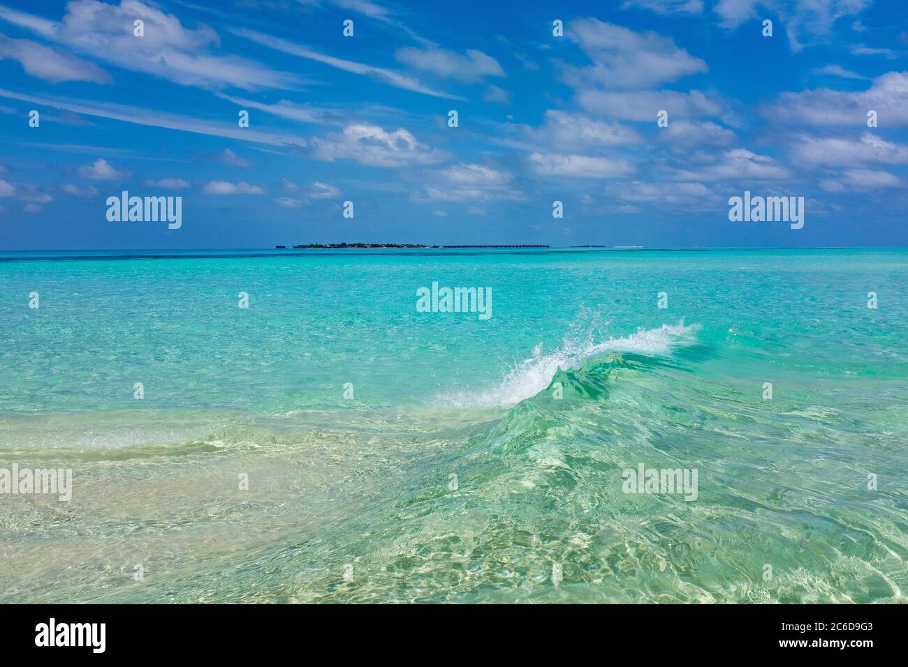 The transparent blue sea of Maldive Island Stock Photo