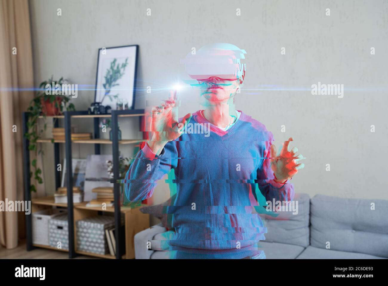 Human Using Virtual Headset Man is using virtual reality headset. Image with glitch effect. Concept ...