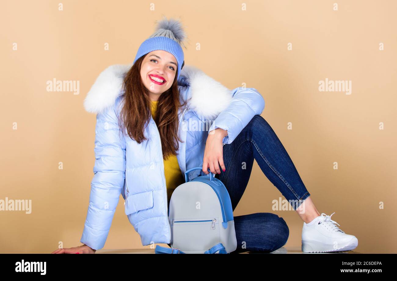 Casual style. Fashion accessory. Girl adorable model with fancy backpack.  Little backpack and knitted hat. Blue pastel outfit. Feeling casual  comfortable. Youth style. Casual outfit for modern life Stock Photo - Alamy