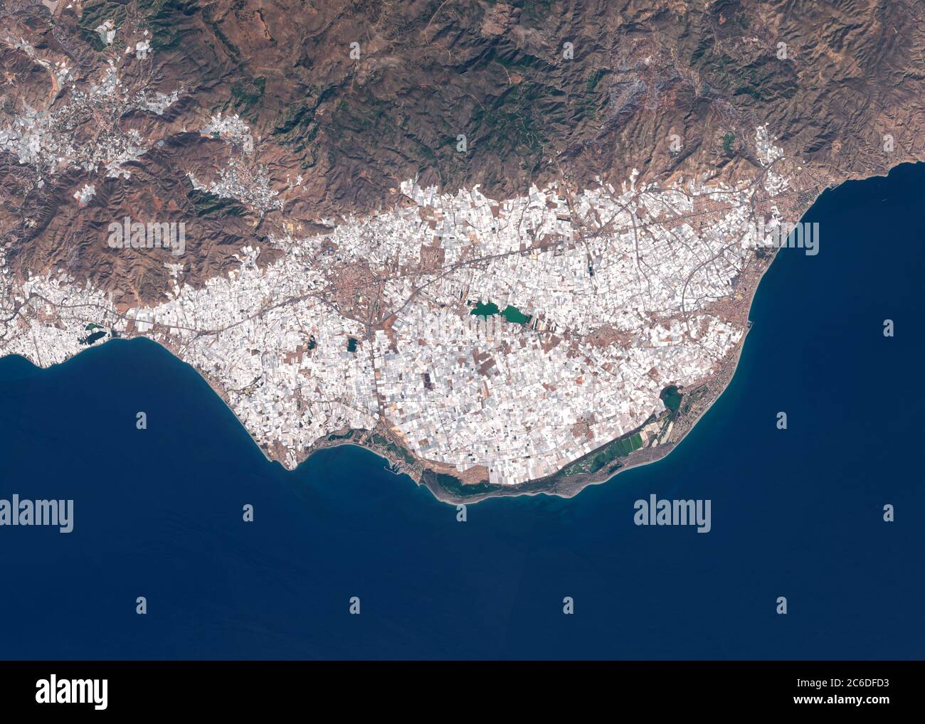 Satellite image of intensive farming with plastic greenhouses in Spain Stock Photo