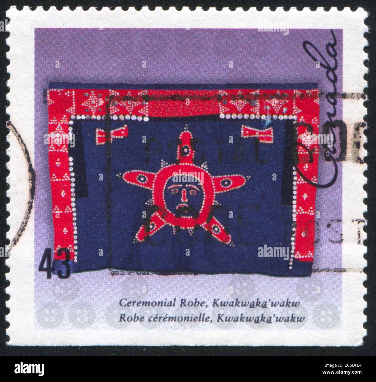 CANADA - CIRCA 1993: stamp printed by Canada, shows Kwakwaka’wakw ceremonial robe, British Columbia, circa 1993 Stock Photo