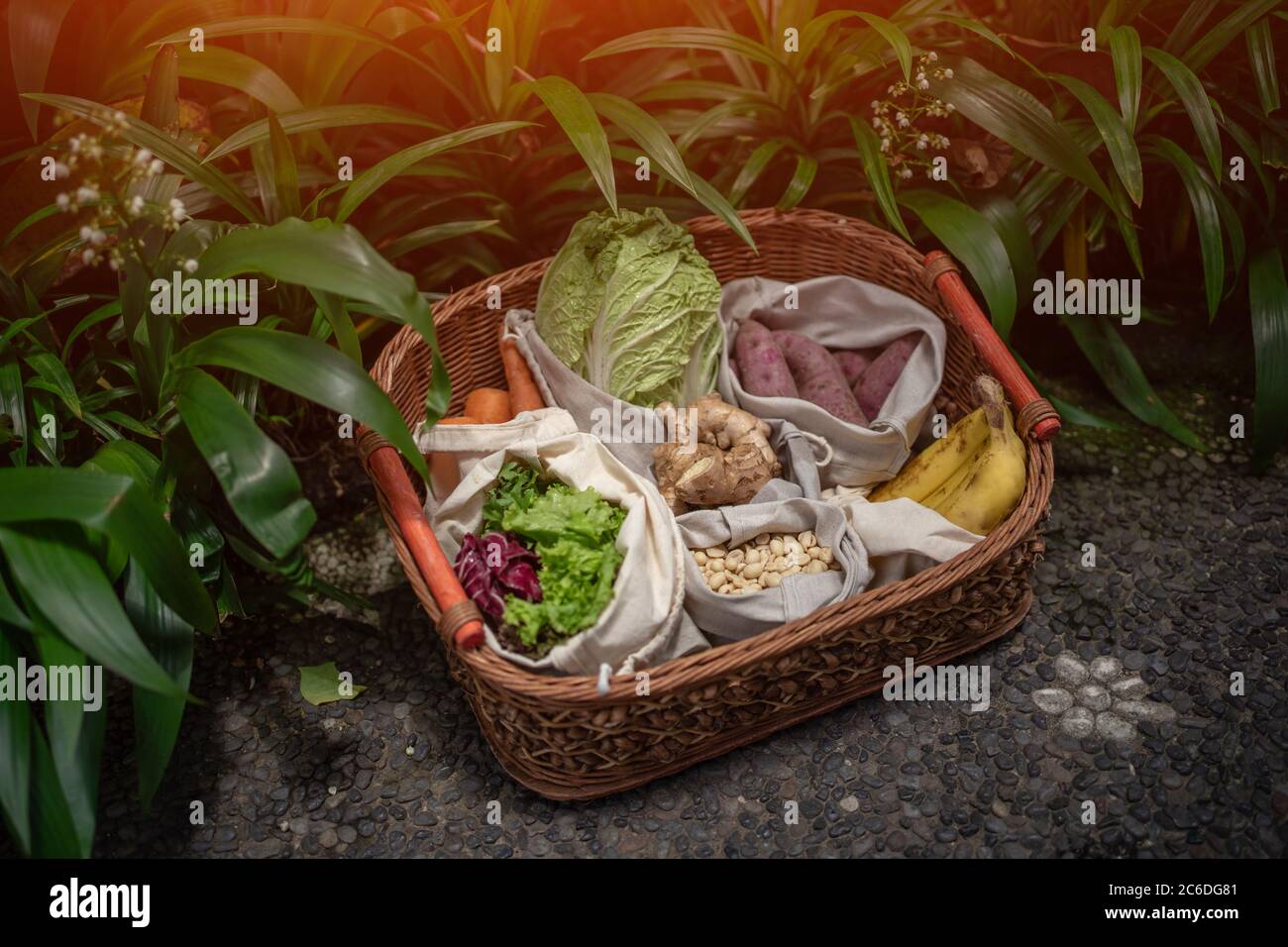 eco friendly and reusable zero waste cotton bags in basket Stock Photo