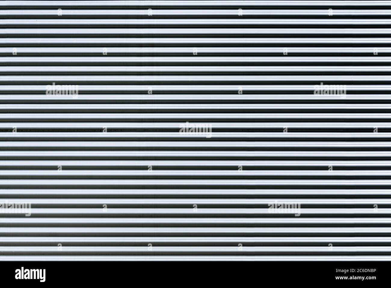 Corrugated metal sheet. New and Modern silver grey background pattern. Stock Photo