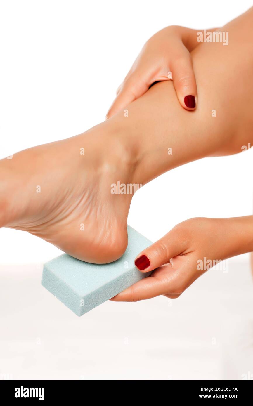 Woman scrubbing skin hires stock photography and images Alamy