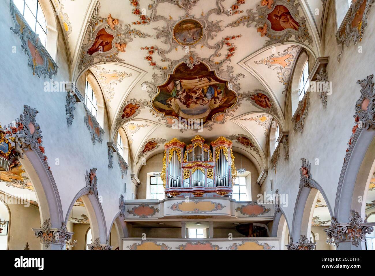 Laufenburg, AG / Switzerland - 4 July 2020: interior view of the St. Johann church in Laufenburg with the organ and ceiling paintings Stock Photo