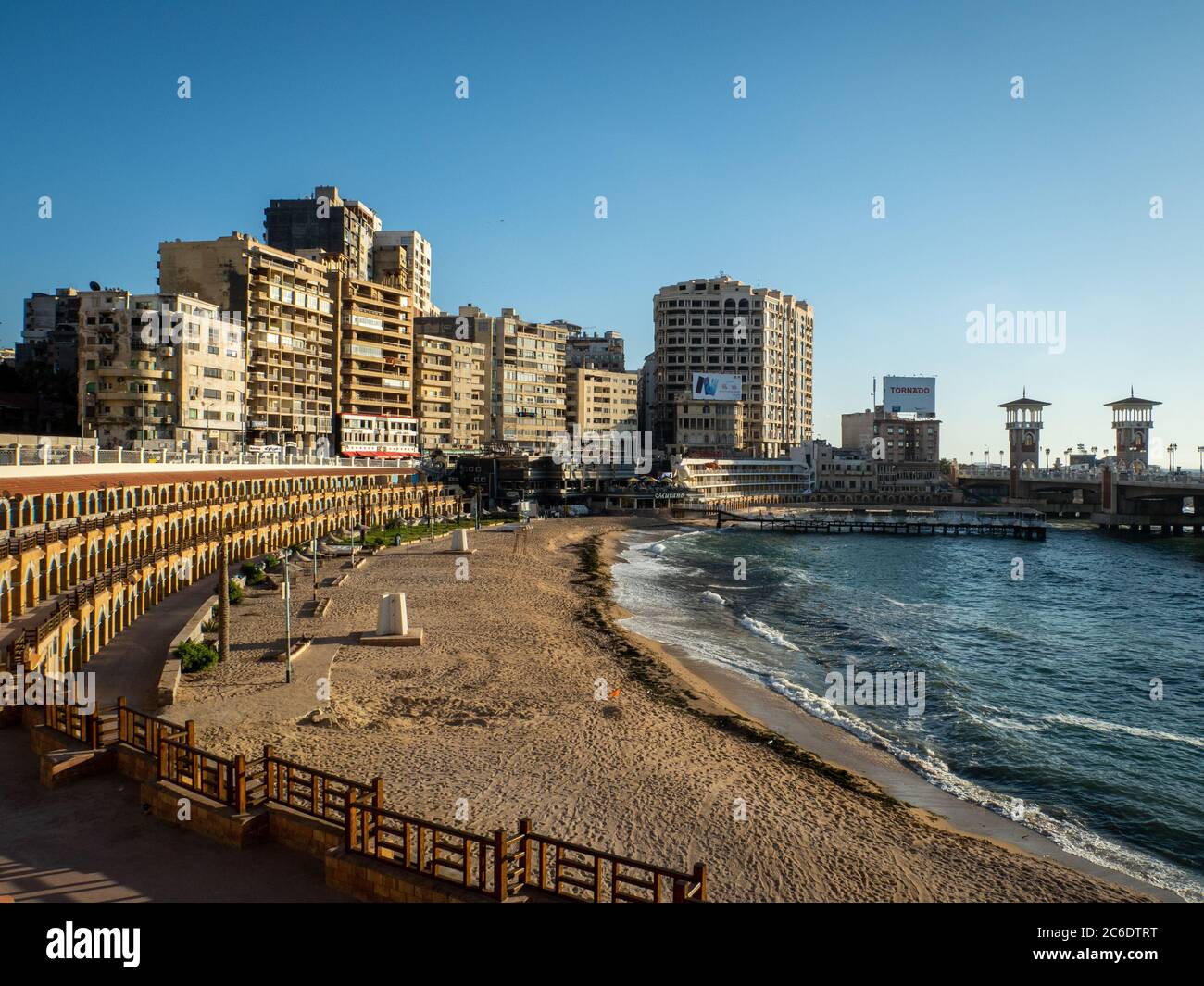 the most famous beach in Alexandria at golden hour - Stanley Beach with the scenic bridge Stock Photo