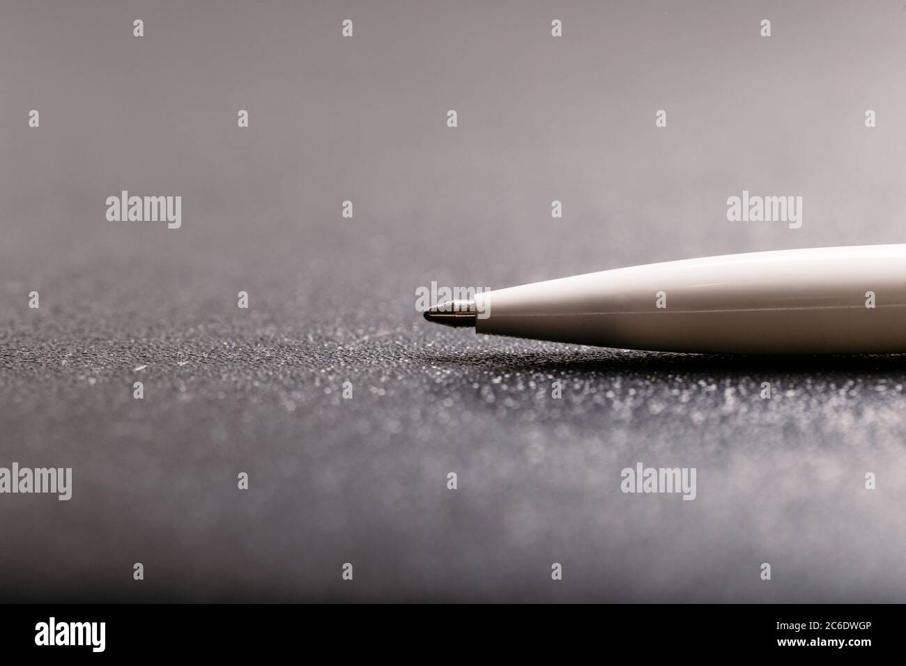 automatic plastic ballpoint pen with clipping path on black background. close up. Stock Photo